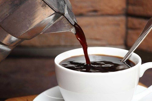 Pouring Coffee In Cup